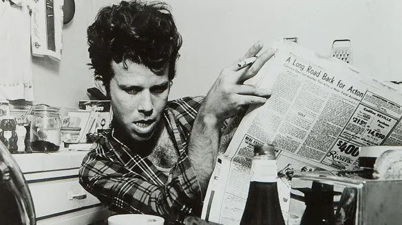 Tom Waits reading the newspaper
