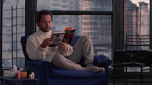Billy Crystal reading Misery by Stephen King in the film When Harry Met Sally