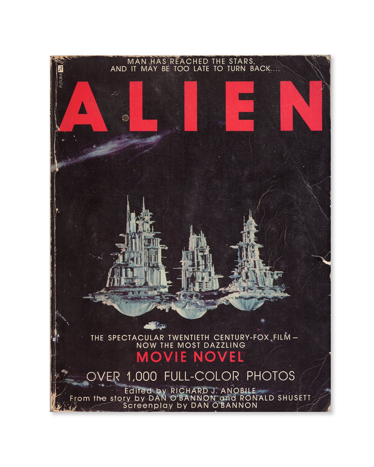 Vintage 'Alien' movie novel book cover with space ship illustration and red text on black background