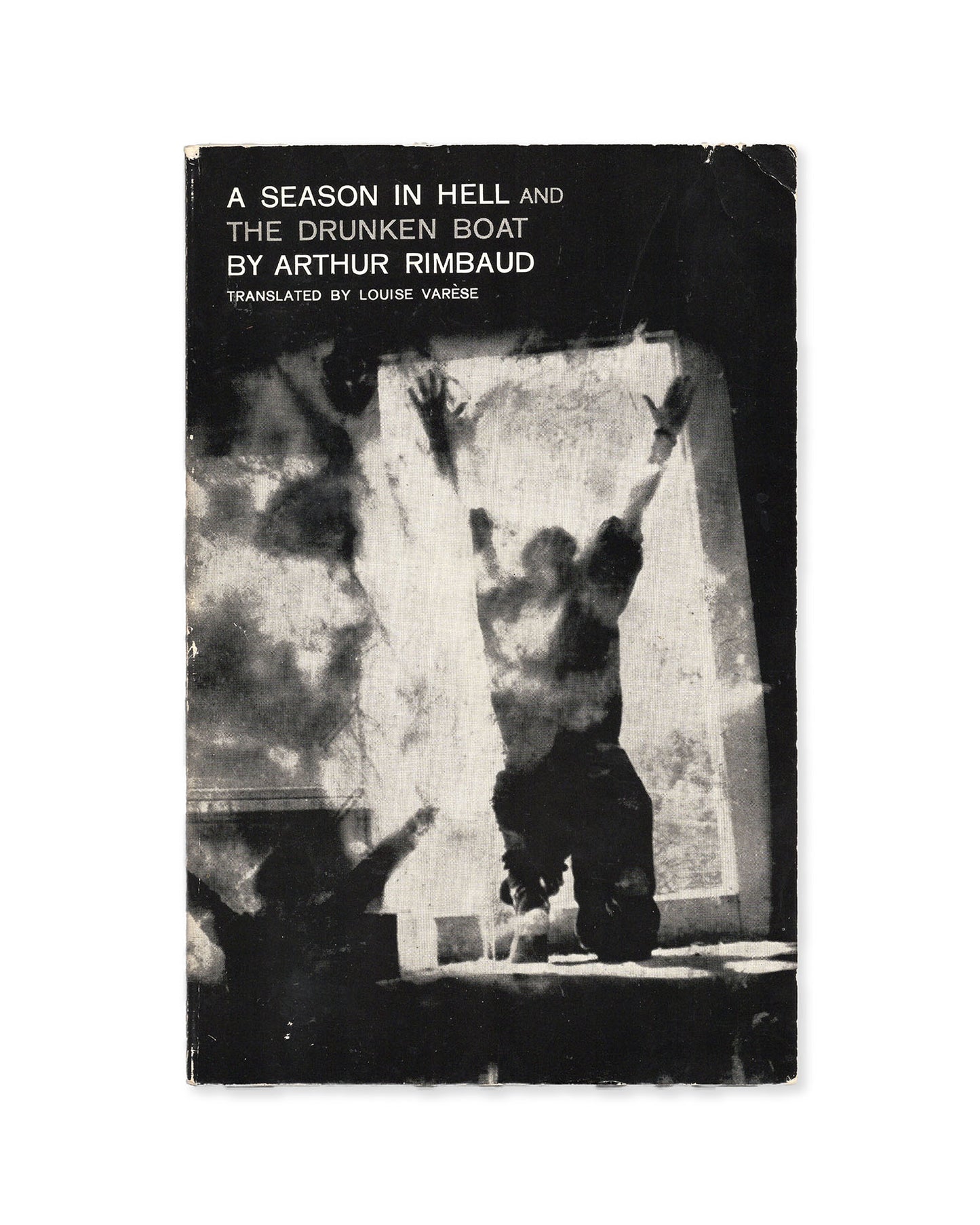 Book cover of 'A Season in Hell and The Drunken Boat' by Arthur Rimbaud with a black and white photo of a person on the cover.