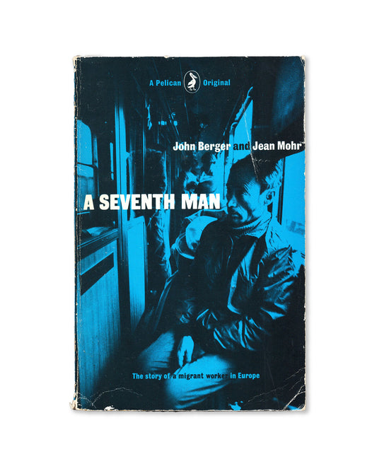 Book cover of 'A Seventh Man' by John Berger and Jean Mohr with a blue and black color scheme featuring a photo of a man on a train.