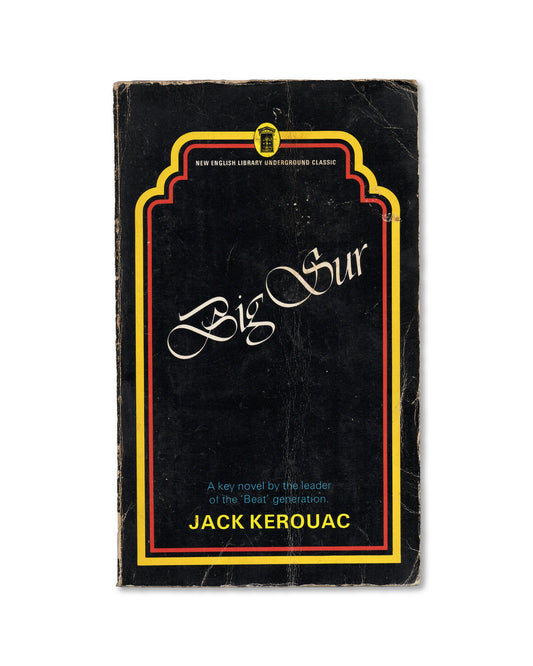 Book cover of 'Big Sur' by Jack Kerouac with a black background and yellow border.