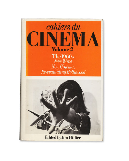 Book cover of 'cahiers du CINEMA Volume 2' with orange background and black text. Featuring a photo of Anna Karina from Godard's Pierrot le Fou.
