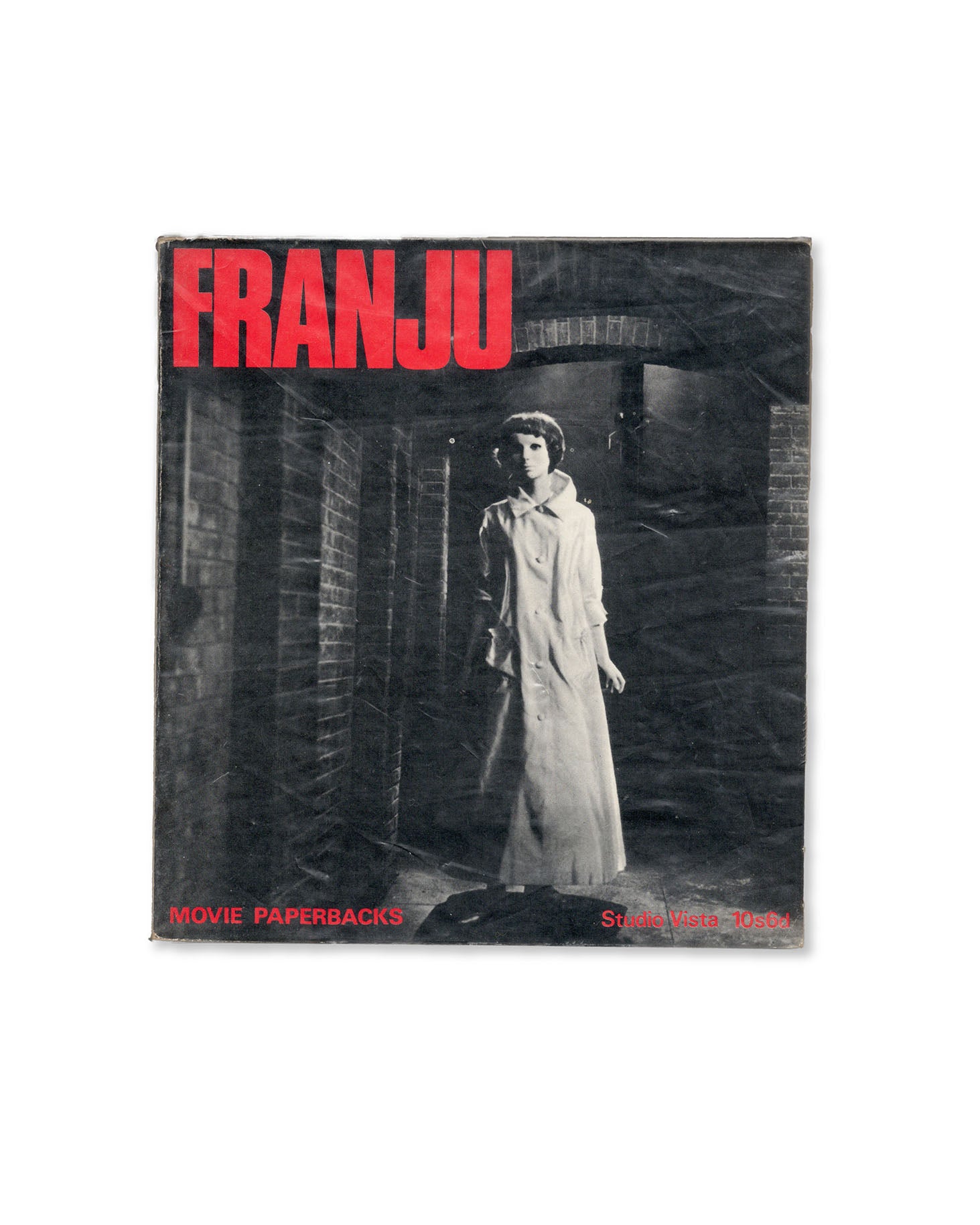 Book cover with a still taken from the film 'Eyes Without a Face' and red text reading the title 'FRANJU'.