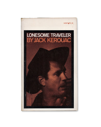 A paperback edition of 'Lonesome Traveler' by Jack Kerouac, featuring a photograph of Kerouac on the cover.