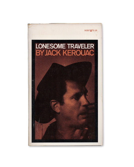 A paperback edition of 'Lonesome Traveler' by Jack Kerouac, featuring a photograph of Kerouac on the cover.
