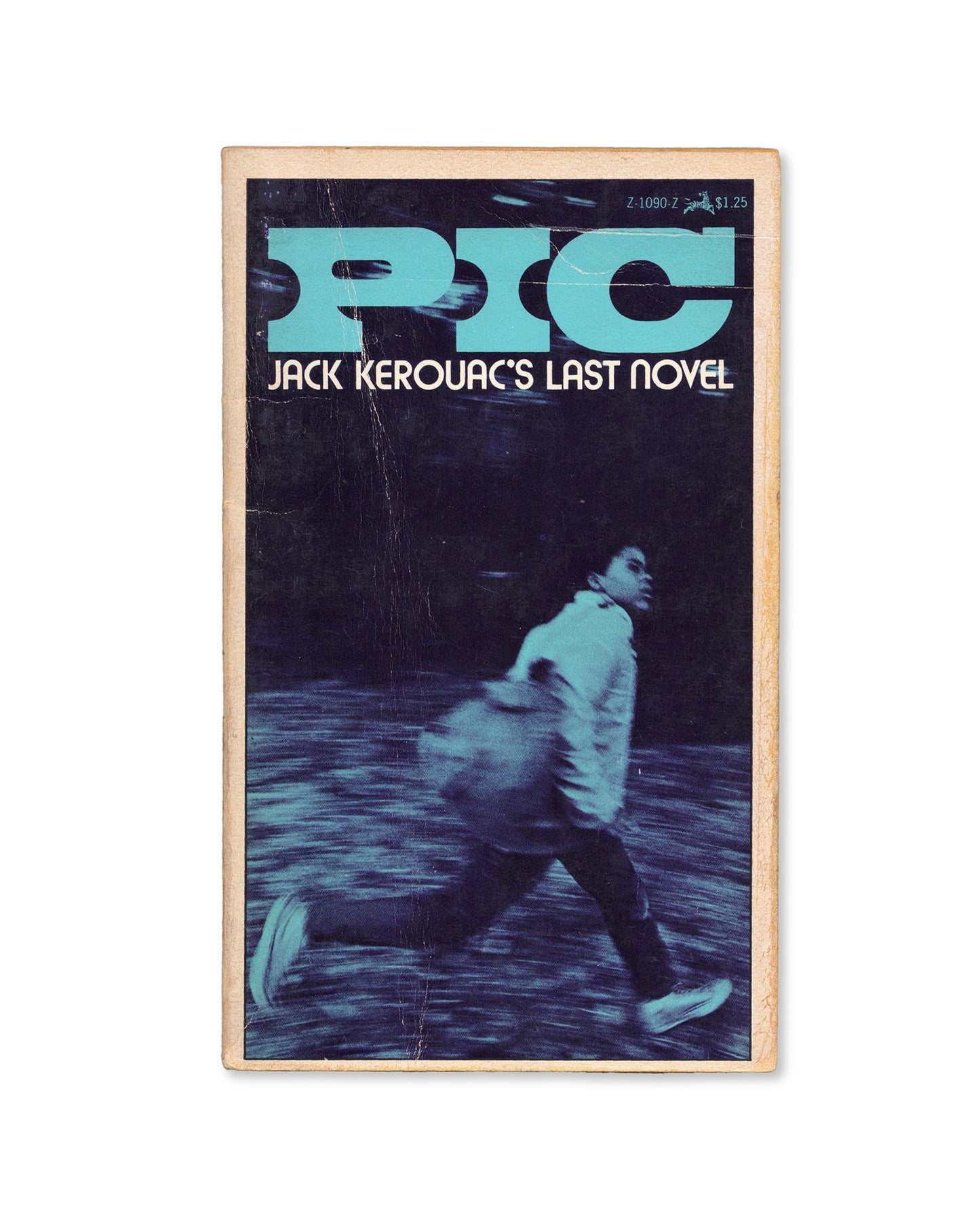 First printing paperback cover of 'PIC' by Jack Kerouac featuring a blue cover with an image of a person running.