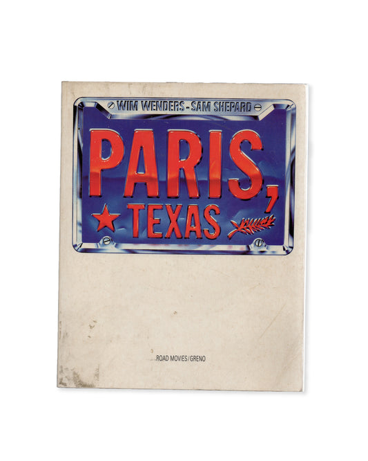 Book Cover of 'Paris, Texas: Photobook' featuring title text. By Wim Wenders and Sam Shepard