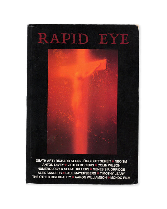 Book cover for Rapid Eye Volume 2 by Simon Dwyer featuring an image of 'Piss Christ' by Andres Serrano