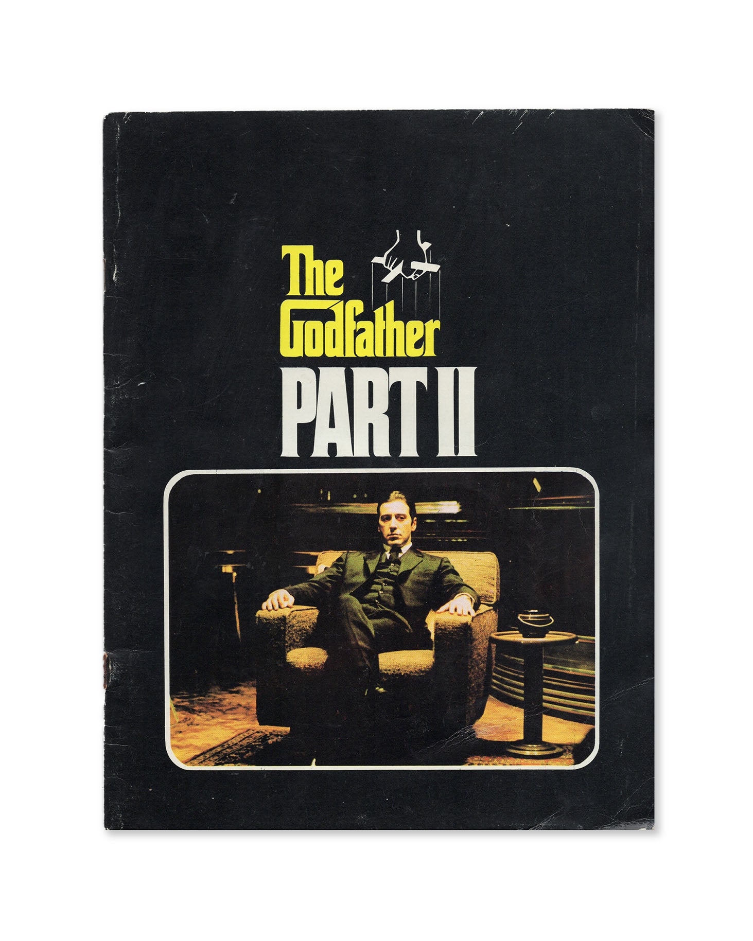 The Godfather Part II Movie Program front cover featuring a still from the film of Al Pacino